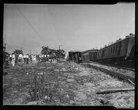 Distant view of derailed train burrowed in ground in aftermath of collision, Glendale, 1935