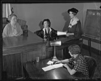 Superior Court judge Georgia Bullock, Mrs. Mary E. Moffett, attorney Florence Anderson and court reporter Mrs. Winifred Gurney at proceedings, Los Angeles, 1935