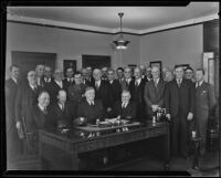 Samuel Moody Haskins, P. B. Harris, and officials discuss railway strike negotiations, Los Angeles, 1934