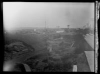 Roadside area deeply eroded by the flood that followed the failure of the Saint Francis Dam, Santa Clara River Valley (Calif.), 1928