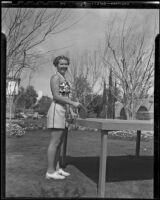 Phyllis Jeffrey plays table tennis on her vacation, Palm Springs, 1936