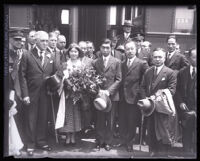 Prince Takamatsu, his bride, and their entourage posing at the train station, Los Angeles, 1931