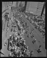 Spectators watch parade commemorating 151st anniversary of settlers in Los Angeles, 1932