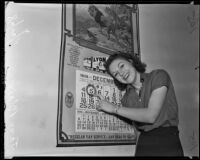 Jane Blair points to day after which taxes become delinquent, Los Angeles, 1938