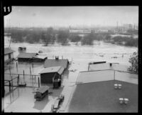 Los Angeles River where the Glendale bridge was washed out by a storm flooding, Los Angeles, 1927