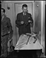 Doug Howatt taking fingerprints at the murder scene of Dr. Charles DuBois, Los Angeles, 1935