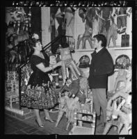 Selling pinatas on Olvera Street, Los Angeles, 1968