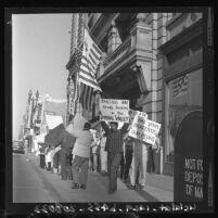 Pickets protesting use of braceros in lettuce harvest in Imperial Valley, Calif., 1961