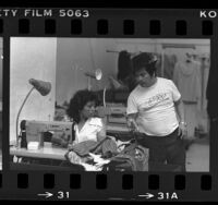 Kanjobal Indian immigrants from San Miguel, Guatemala, working in their garment shop in Los Angeles, Calif., 1984