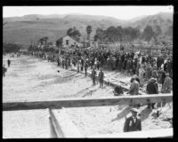 Swimmers on the shore before the start of the Wrigley Ocean Marathon at Isthmus Cove, Santa Catalina Island, 1927