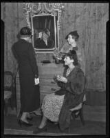 Sorority women Beth Tibbot, Thelma Chambers, and Mrs. R. H. Lewis shop for antiques, Los Angeles, 1936