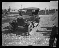 Chevrolet car, used as a getaway vehicle after three men robbed Pacific National Bank, Los Angeles, 1926