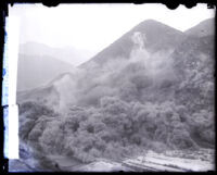 Explosion debris in San Gabriel Canyon during the construction of San Gabriel Dam, Los Angeles County, 1929