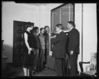 Lillian Butterfield with 3 young men, Coroner Ira Nance and Judge Louis Russill, Los Angeles, 1931