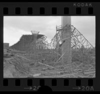 Collapsed scaffolding surrounding columns during construction of Simi Valley-San Fernando Valley Freeway, Simi Valley, 1974