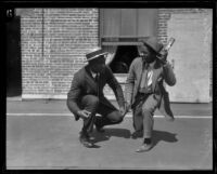 George Godfrey, heavyweight boxer with his brother [outside the KJH Radio studio?], [Los Angeles(?)], circa 1926-1927