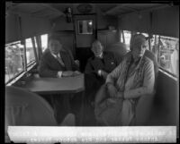 James A. Talbot, Anthony Fokker and Violet Fokker sit in the cabin of a Fokker aircraft, Montebello, [1928]