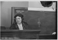 Henrietta McDonald testifies in the Dolores Costello, John Barrymore divorce case, Los Angeles, copy print, 1935