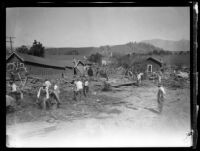 African American workers clearing flood debris following the flood resulting from the failure of the Saint Francis Dam, Santa Clara River Valley, 1928