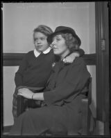 Buron Fitts' wife Marion and daughter Mary Lou wait while Fitts is tried for perjury, Los Angeles, 1936