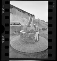 Bill Bound at entrance to his underground smog alert chamber in Manhattan Beach, Calif., 1971