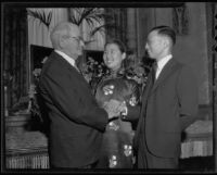 Clarence H. Matson greets Mr. and Mrs. Yi-Seng S. Kiang at the Jonathan Club, Los Angeles, 1935