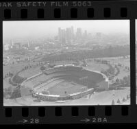 Aerial view of Dodger Stadium with downtown Los Angeles in background, Los Angeles, 1984