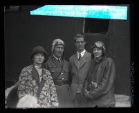 Greta Nissen, Capt. Roscoe Turner, Howard Hughes, and Carline Turner, beside a plane, Los Angeles, circa 1928