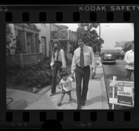 Tom Hayden with his wife, Jane Fonda and their son, Troy walking in Santa Monica, Calif., 1976