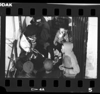 Addicts smoking crack in downtown Los Angeles, Calif., 1988