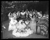 Jose Arias, "Troubador of Southern California" during rehearsal with his family troupe, 1948