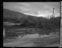 Landscape with puddles and debris deposited by the flood following the failure of the Saint Francis Dam, Santa Clara River Valley (Calif.), 1928