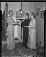 Bertha Detling, Josephine Zobelein and Frances Kupfer plan to host a tea and reception for new members of the Catholic Women's Club, Los Angeles, 1936