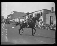 Will Rogers Jr. on horseback in the parade of the Old Spanish Days Fiesta, Santa Barbara, 1930