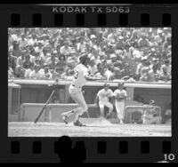 Dodgers' Enos Cabell watching the first grand slam of his career head toward the fence, Los Angeles, Calif., 1986