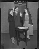 Helen Hulick and her attorney, William Katz, along with notary, Jeanette Dennis, Los Angeles, 1938