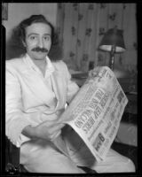 Mystic Meher Baba reading newspaper, Hollywood, 1932