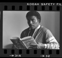 Little Richard reading his biography, 1984