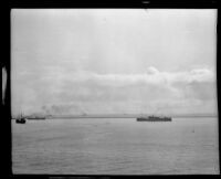 US Navy battleships head out to sea from the Port of Los Angeles, San Pedro