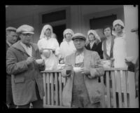 Five Red Cross workers serving coffee to relief workers after the flood following the failure of the Saint Francis Dam, Santa Clara River Valley (Calif.), 1928