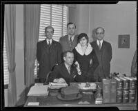 Ex-Judge Guy F. Bush and wife Leila LeGrand with attorneys Hahn, Holbrook and Bole at Hahn's office, Los Angeles, 1935