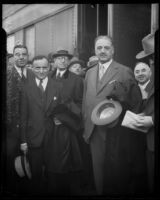 A. P. Giannini and A. J. Scampini arrive by train, Los Angeles, 1930s