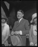 Two women and a man at an American Legion event, Los Angeles, 1920s