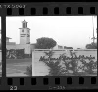 Farmer's Market clock tower and sign reading "Meet me at Third and Fairfax" in Los Angeles, Calif., 1990