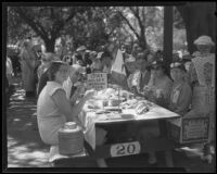 Picnickers at the Iowa Golden Wedding Club table at the annual Iowa Association picnic at Bixby Park, Long Beach, 1935