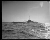 A V-5 submarine "N1" streams through the water during the annual Navy Fleet Parade along the Southern California coast, 1932