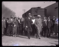 Asa Keyes, released from prison, greeted at the train station by Ben Getzoff (?), Glendale, 1931