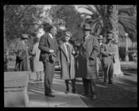 Mrs. Northcott standing with two men outside, Riverside, circa 1928