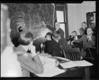 Los Angeles Superintendent of Parks Frank Shearer with large map of Griffith Park, [Los Angeles?], [1933?]