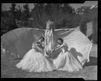 Three members of the California Music Club Juniors - Shirley Smith, Elizabeth Hunt and Virginia Solomon - in a rehearsal for a holiday play, Los Angeles, 1935